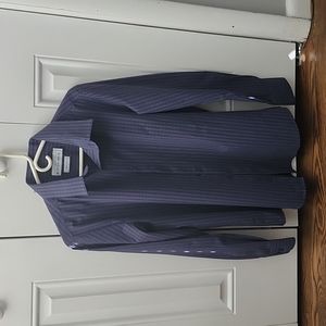 Mizzen + Main  medium trim fit shirt. Navy blue with thin red and white stripes.